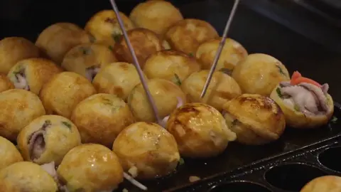 Cinematic Japanese Takoyaki Chef Prompt