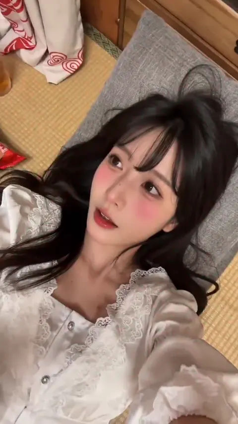 Coser Resting on Tatami After Party