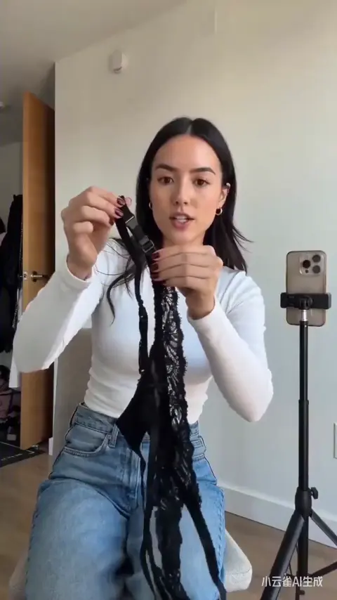 UGC video of a girl demonstrating stockings in a dressing room